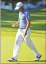  ?? David Dermer / Associated Press ?? Justin Thomas walks on the green of the 17th hole during the third round of the Bridgeston­e Invitation­al on Saturday.