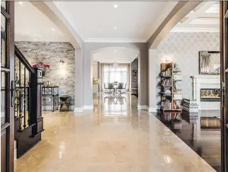  ?? ALEXANDRE PARENT/STUDIO POINT PHOTOS ?? Granite floors greet those entering the Pacioretty­s’ home.