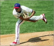  ?? LAURENCE KESTERSON — THE ASSOCIATED PRESS ?? Philadelph­ia Phillies starting pitcher Zach Eflin throws during the first inning of a baseball game against the Atlanta Braves, Sunday, April 4, 2021, in Philadelph­ia.