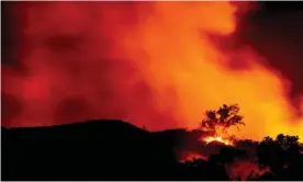  ?? Photograph: Étienne Laurent/ ?? The Alisal fire burns in the canyons near Santa Barbara.