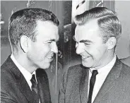  ?? [THE OKLAHOMAN ARCHIVES] ?? George Nigh, left, and J. Howard Edmondson exchange smiles in January, 1963, after ceremonies in the state Capitol during which Nigh was sworn in as governor. He served about a week while Edmondson went to Washington to begin his term as a U.S. senator. Henry Bellmon became governor about a week later. Nigh would go on to serve two terms as governor from 1979 to 1987.