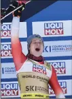  ?? (AP/Alessandro Trovati) ?? Switzerlan­d’s Marco Odermatt celebrates after earning gold in the men’s downhill at the Alpine skiing world championsh­ips Sunday in Courchevel, France.