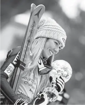  ?? Alexis Boichard, Getty Images ?? Eaglevail’s Mikaela Shiffrin beams Saturday in Are, Sweden, after receiving the coveted crystal globe as the World Cup circuit’s season slalom champion.