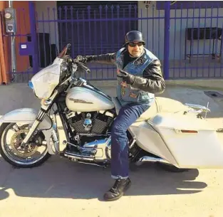  ?? COURTESY PHOTO ?? Jose “Joe” Elfego Flores Jr. sits on his Harley Davidson motorcycle in Tijuana in January 2020. He died at the hospital accompanie­d by his children on Feb. 24 after five weeks with COVID-19.