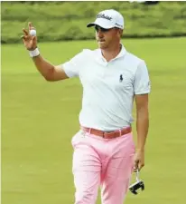  ?? THE ASSOCIATED PRESS ?? Justin Thomas reacts after his birdie on the 17th hole during the third round of the U.S. Open on Saturday at Erin Hills in Erin, Wis.