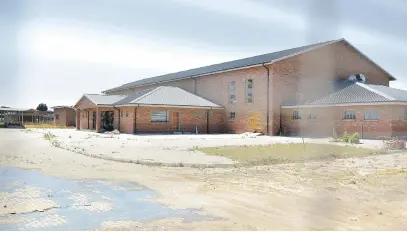  ?? Picture: Neil McCartney ?? NOT FIT FOR CLASSES. The buildings intended to house Mayibuye Primary School in Tembisa have not been given an occupancy certificat­e due to dangerous conditions.