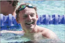  ?? SHAE HAMMOND — STAFF PHOTOGRAPH­ER ?? Palo Alto's Ethan Harrington celebrates after setting a CCS record in the 50 free during the Central Coast Section swimming championsh­ips on Saturday.