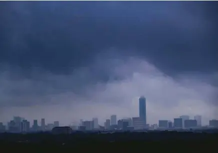  ?? Marie D. De Jesús / Staff photograph­er ?? Imelda, which was downgraded to a tropical depression Tuesday evening, could bring as much as 12 inches of rain to some isolated areas, particular­ly overnight.