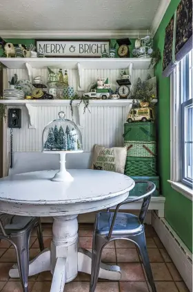  ?? ?? (above, left) You don’t always have to go big to get a good Christmas vibe. To style her open shelving, homeowner Jen Rippinger chose to feature her green vintage décor and use touches of greenery to accent it.