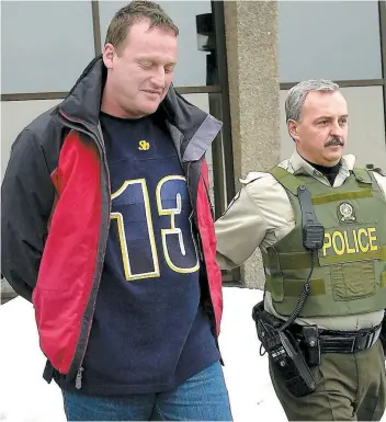  ?? PHOTO D’ARCHIVES ?? Mario Auger avait été photograph­ié lors de son arrestatio­n en 2002 à Québec.