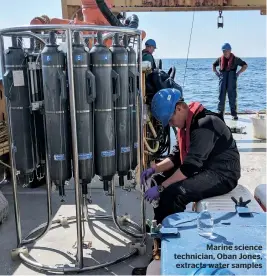 ??  ?? Marine science technician, Oban Jones, extracts water samples