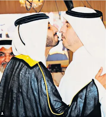  ??  ?? Qatar’s prime minister, right, greets the groom, whose father, Abd al-Rahman bin Umayr al-Nuaymi (back), says Qatar, finances terror