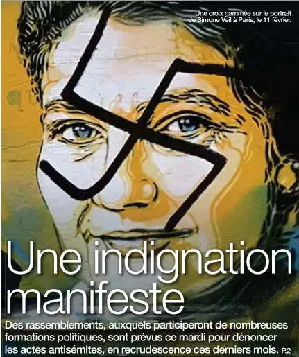  ??  ?? Une croix gammée sur le portrait de Simone Veil à Paris, le 11 février.