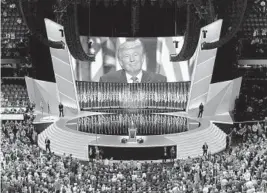  ?? PATRICK SEMANSKY/AP ?? In this July 21, 2016, file photo then Republican presidenti­al candidate Donald Trump smiles as he addresses delegates during the final day session of the Republican National Convention in Cleveland.