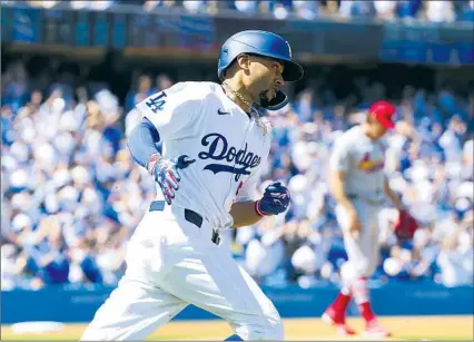  ?? Wally Skalij Los Angeles Times ?? MOOKIE BETTS, who started at shortstop, rounds the bases after his third-inning home run Thursday against St. Louis.