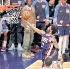  ?? AFP ?? The Nets’ Kyrie Irving shoots against the Celtics during a play-off game in April.