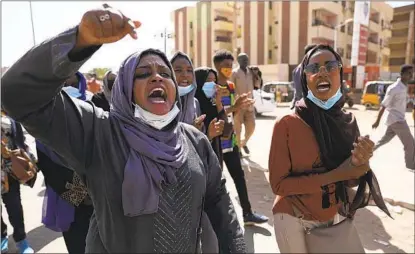  ?? MARWAN ALI AP ?? Protesters gather in Khartoum, Sudan, on Saturday, demanding a faster pace to democratic reforms as they mark the second anniversar­y of the uprising that led to the military’s ouster of strongman Omar al-bashir.