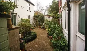  ??  ?? ‘Idyllic’: Mr Johnston’s home, on right, opposite De Jong’s house