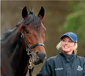  ?? GETTY IMAGES ?? The Chosen One with strapper Aleisha Legg in Melbourne ahead of today’s big race.