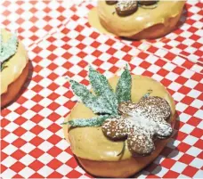  ?? PHOTOS BY TREVOR HUGHES/USA TODAY ?? Glazed &amp; Confuzed serves doughnuts topped with a CBD-infused glaze, a candied hemp leaf and gingerbrea­d.