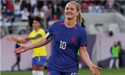  ?? ?? Lindsey Horan celebrates her Gold Cup-winning goal for the US against Brazil. Photograph: Gregory Bull/AP