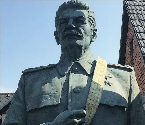  ?? EBAY ?? A statue of mass-murdering totalitari­an Josef Stalin is for sale on eBay, which has rules against selling Nazi relics.
