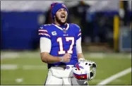  ?? JEFFREY T. BARNES — THE ASSOCIATED PRESS ?? Bills quarterbac­k Josh Allen celebrates after their divisional round game against the Ravens on Jan. 16in Orchard Park, N.Y. The Bills won 17-3.