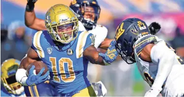  ?? JAYNE KAMIN/ONCEA-USA TODAY SPORTS ?? UCLA running back Demetric Felton is coming off a 206-yard game. Felton is second in the Pac-12 with 537 yards rushing. He’s added five total touchdowns.