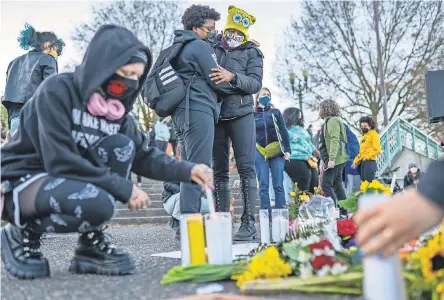  ?? NATHAN HOWARD/ GETTY IMAGES ?? Protests and vigils have played out in cities across the U. S., including in Portland, Ore., after the shooting death of 20- year- old Daunte Wright during a traffic stop Sunday in Brooklyn Center, Minn.