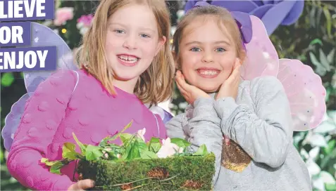  ?? Picture: PETER RISTEVSKI ?? Evie Bean, 6, and Chloe Tayler, 7, play in the magical world of elves and fairies at Market Square.