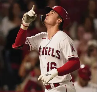  ?? RYAN SUN – THE ASSOCIATED PRESS ?? The Angels' Mickey Moniak celebrates his two-run homer against the A's in the fifth inning on Friday night.