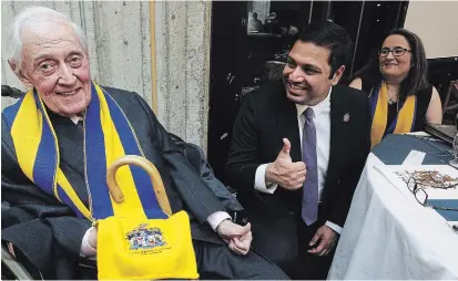  ?? CLIFFORD SKARSTEDT EXAMINER FILE PHOTO ?? Founding Trent University president Tom Symons, left, appears at the Lady Eaton College 50th anniversar­y on Jan. 18, 2019, at the school. Symons, who died Friday at the age of 90, helped shape athletics during the early years at Trent.