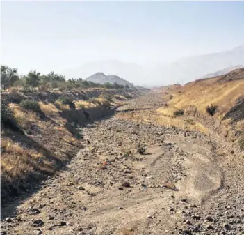  ??  ?? ►
Estado actual del río Colina, Región Metropolit­ana, esta semana.