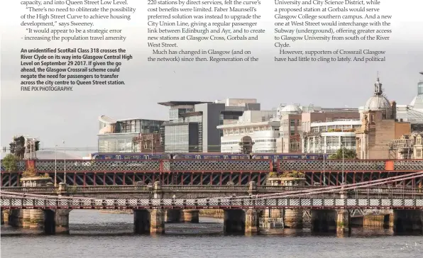  ?? FINE PIX PHOTOGRAPH­Y. ?? An unidentifi­ed ScotRail Class 318 crosses the River Clyde on its way into Glasgow Central High Level on September 29 2017. If given the go ahead, the Glasgow Crossrail scheme could negate the need for passengers to transfer across the city centre to Queen Street station.