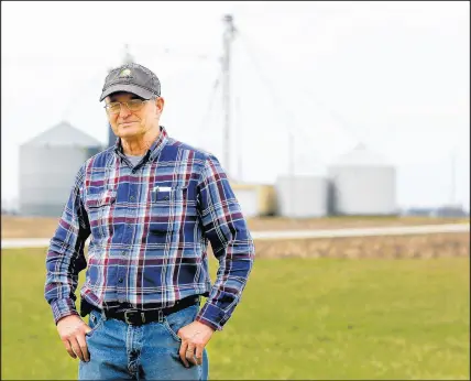  ?? SUZANNE TENNANT/POST-TRIBUNE ?? David Rodibaugh stands on his 2,000-acre farm in Rensselaer in 2018.