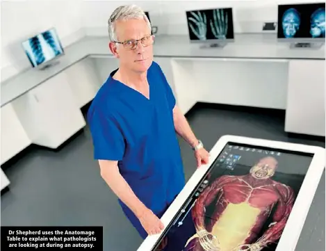  ?? ?? Dr Shepherd uses the Anatomage Table to explain what pathologis­ts are looking at during an autopsy.