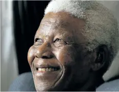  ?? THEMBA HADEBE/AP FILES ?? South African President Nelson Mandela smiles during a meeting in Johannesbu­rg, South Africa.