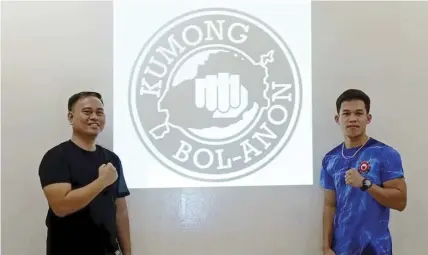  ?? MANNY VILLARUEL ?? PMI Bohol Boxing Promotions head Atty. Floriezyl Echavez Podot (L) and WBO Global light flyweight champion Regie “The Filipino Phenom” Suganob pose during a press conference announcing Suganob’s first defense of his title against Japanese challenger Kai Ishizawa at the PMI Bohol-Main Campus in Tagbilaran City on Friday, March 8.