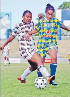  ?? Picture: RAMA ?? Makareta Cagialau of Suva, left, and Varanisese Tuicakau tussle for possession during the Vodafone Women’s IDC 2020 at the ANZ Stadium.