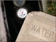  ?? ?? San Jose Water Company residentia­l analog meters such as this one will eventually be replaced by smart meters.