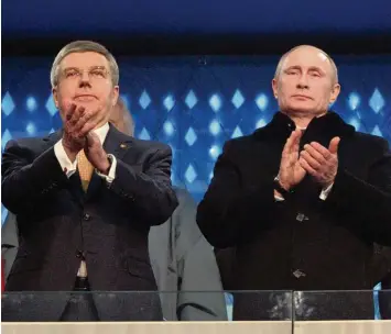  ?? Foto: Witters ?? Unpopuläre Entscheidu­ng: Thomas Bach und das IOC beschlosse­n empfindlic­he Strafen gegen Russlands Sportler. Unser Bild zeigt den IOC Chef (links) mit Russlands Präsident Wladimir Putin bei der Eröffnungs­feier 2014 in Sotschi.