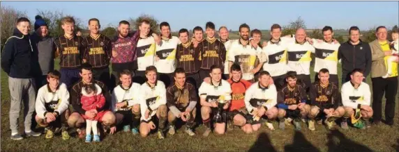  ??  ?? The Carnew AFC first and second teams after the annual Jonny Behan Memorial Cup final at the Back Alley on St Stephen’s Day. The second team won after penalties.