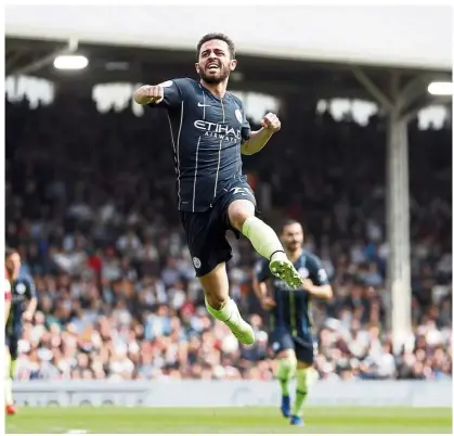  ?? — AP ?? Amazing transforma­tion: Manchester City’s Bernardo Silva celebrates after scoring the opening goal during the Premier League match against Fulham at Craven Cottage last Saturday.