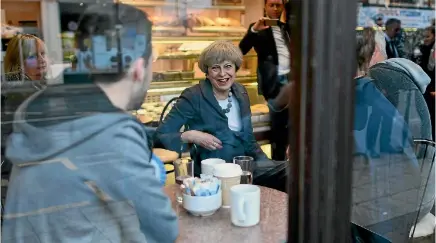  ?? PHOTO: REUTERS ?? Britain’s Prime Minister Theresa May visits a bakery during an election campaign visit to Fleetwood, Lancashire.