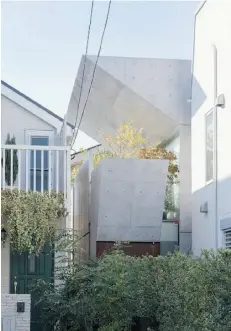  ??  ?? Bent House, designed by Koji Tsutsui & Associates in Tokyo. Japanese architects favour concrete in tight spaces.