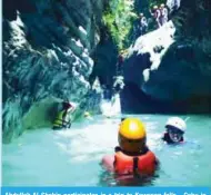  ??  ?? Abdullah Al-Shahin participat­es in a trip to Kawasan falls - Cebu in the Philippine­s.