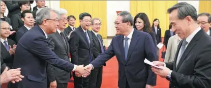  ?? FENG YONGBIN / CHINA DAILY ?? Premier Li Qiang meets with a delegation of Japanese business leaders in Beijing on Jan 25.