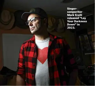  ?? SUZANNE KREITER/GLOBE STAFF ?? Singersong­writer Mark Erelli released “Lay Your Darkness Down” in 2023.