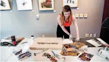  ?? [PHOTO BY JIM BECKEL, THE OKLAHOMAN] ?? Marissa Raglin, the 2017-18 Skirvin artist in residence, works Friday in the studio on the first floor of the Skirvin Hilton Hotel.