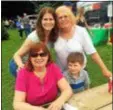  ?? PEG DEGRASSA – DFM ?? Mary Lafferty of Newtown Square, left, is surrounded by her daughter Colleen Lafferty, her sister Sue Stephan and her grandson Nate Lafferty at the Ninth Annual Italian Heritage Festival at Rose Tree Park. The day brought families together to enjoy Italian food, culture and car show.